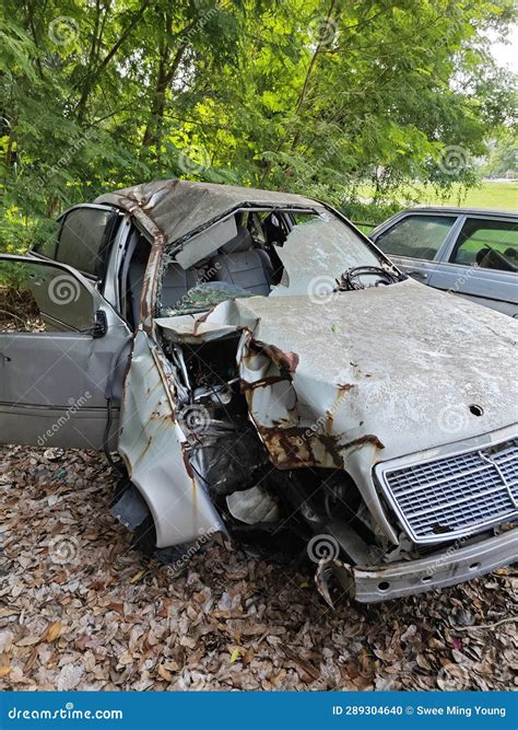 Unrecognizable and Wrecked Cars Beyond Repair Left at the Isolated Junk Yard. Stock Photo ...