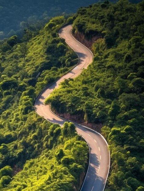 Premium Ai Image Aerial View Of Car Driving On Beautiful Steep Curved