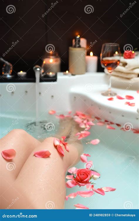 Woman Taking Bath With Rose Petals Closeup Romantic Atmosphere Stock