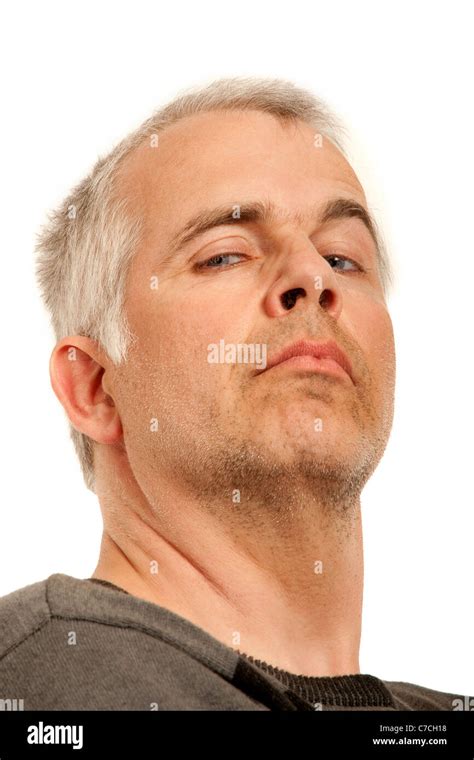 Unshaven Man With Arrogant Expression Looking Down Stock Photo Alamy