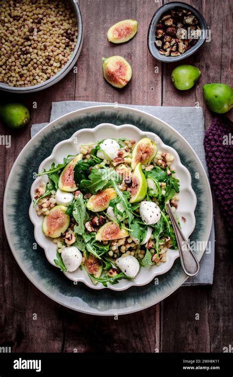 Fregola Sardinian Pasta With Figs And Mozzarella Stock Photo Alamy