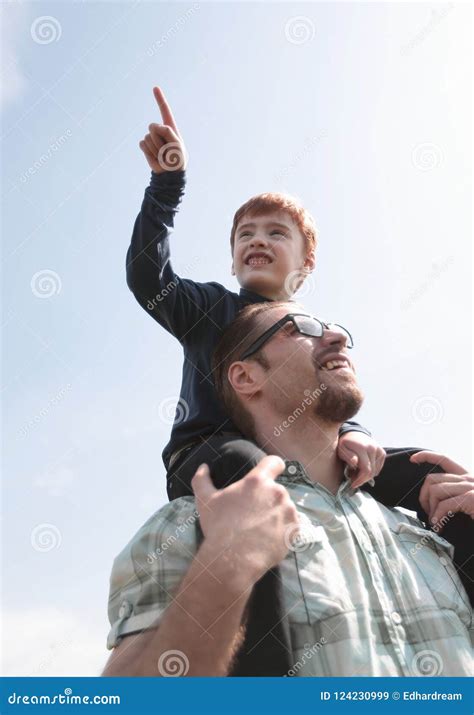 Happy Son Sits On His Father`s Shoulders Stock Image Image Of Activity Joyful 124230999