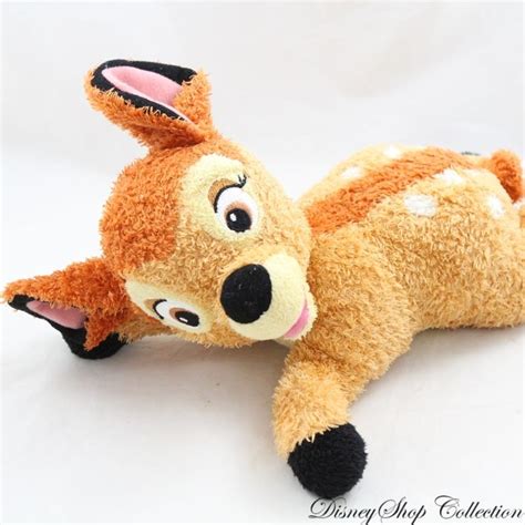 Peluche Bambi DISNEY NICOTOY biche marron allongé sur le ventre poi