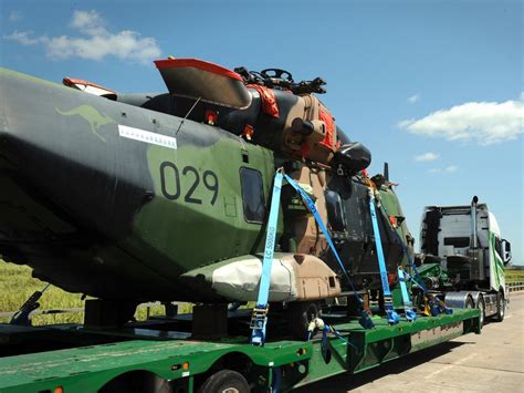 Grounded Australian Army MRH-90 Taipan helicopter trucked to Townsville | Townsville Bulletin