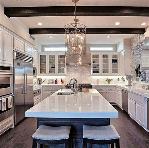 Large Spacious White Open Kitchen With White Granite Countertops Love