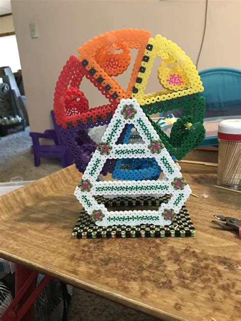 Perler Bead Sculpture On Wooden Table
