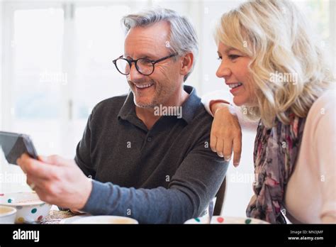 Mature Couple Taking Selfie With Smart Phone Stock Photo Alamy