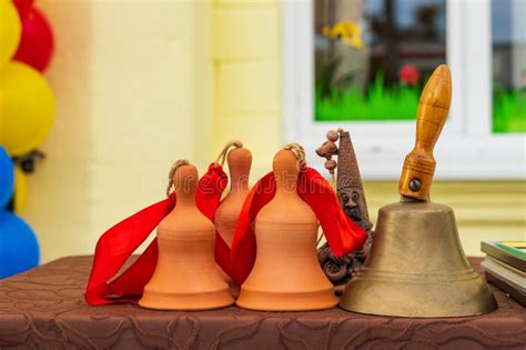 Hand Bells For A Symbolic First And Last Bell At School Background