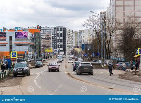 Andreevka, Russia - April 11.2016. Traffic on Main Street Editorial ...