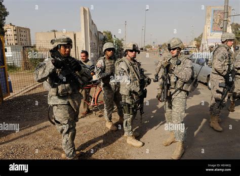 U.S. Soldiers from 1st Battalion, 5th Cavalry Regiment, 1st Cavalry Division, set up a random ...