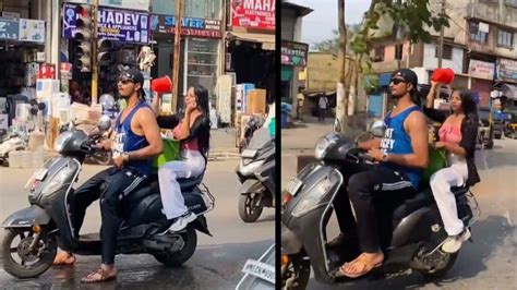 Video Of Couple Bathing While Riding Scooty In Maharashtra Goes Viral