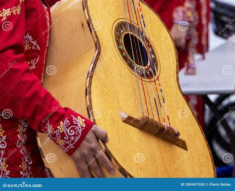 Close Up Shot Of Unrecognizable Mariachi Woman Holds A Mariachi