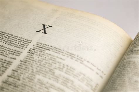 Close Up Romans Letter English Alphabet On Dictionary Book Stock Photo