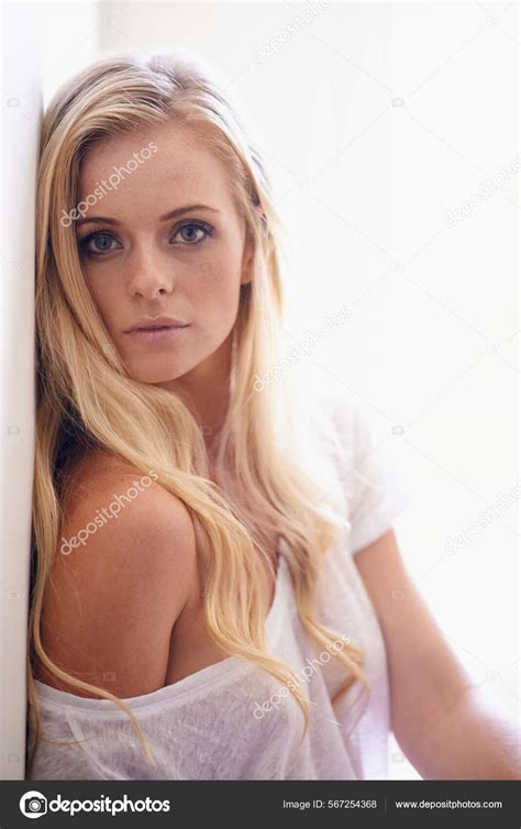 Simple Seduction Cropped Shot Of A Gorgeous Woman Posing In A White T