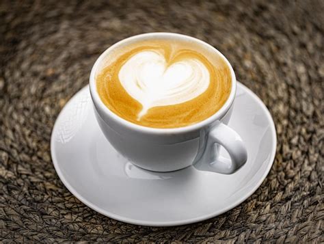 Premium Photo Cup Of Coffee With Heart Shape