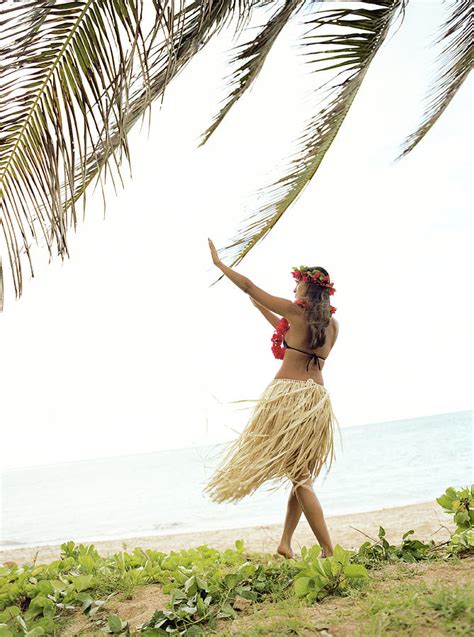 Woman Wearing Grass Skirt Doing Hula By Steven Lam