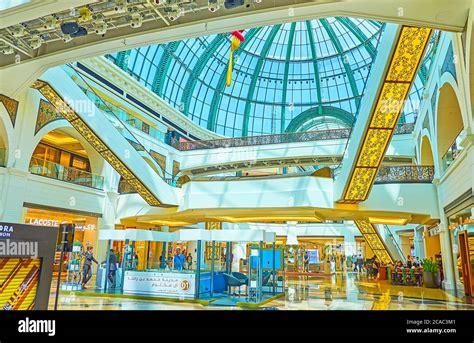 DUBAI, UAE - MARCH 5, 2020: The foyer of Mall of the Emirates with glass vault, multi-level ...