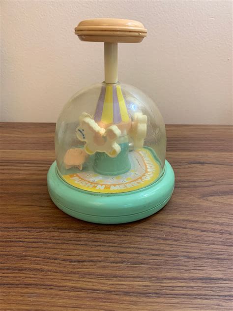 Redstorevintage Presents Vintage Tomy Push N Merry Goround Toy