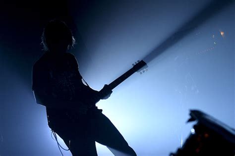 Elevate Your Designs With Guitarist Silhouette Images Meta