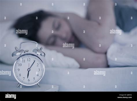 Beautiful Brunette Sleeping In Her Bed Stock Photo Alamy