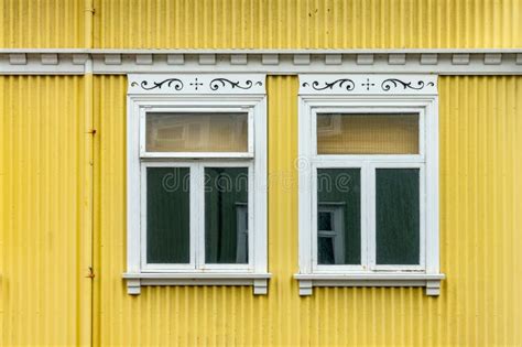 Windows On A Yellow Painted Wall Colorful House Architecture Detail