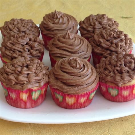 Vanilla Cupcakes With Strawberry Filling And Nutella Buttercream