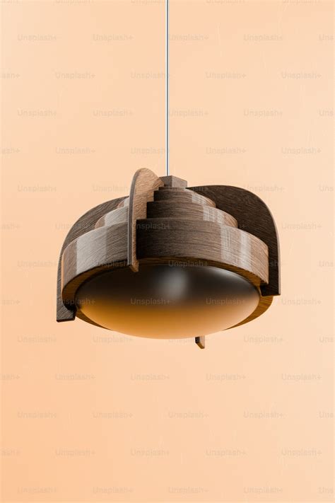 Foto Una Lámpara De Madera Que Cuelga Del Techo Elementos Interiores