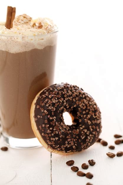 Free Photo Ice Coffee With Whipped Cream And Donut