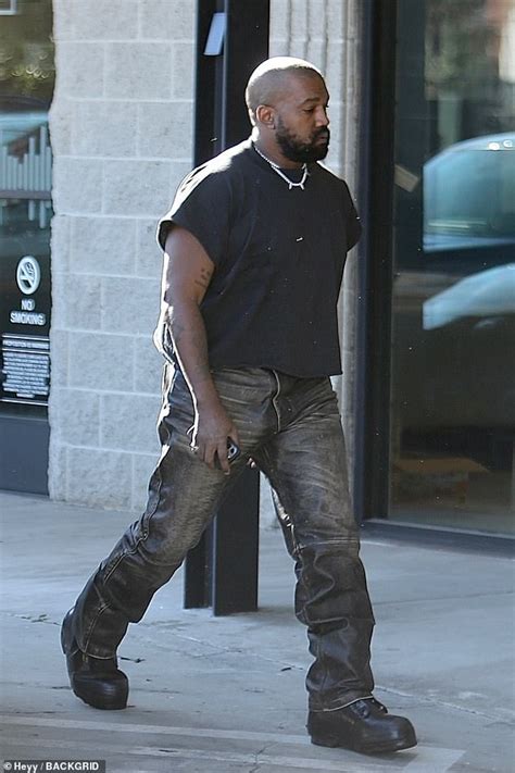 Kanye West Surprises Photographers With Impromptu Photoshoot Featuring