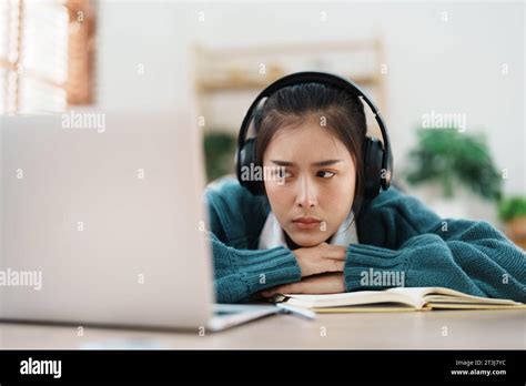 Studying Online Beautiful Asian Female Student Show Symptoms Burnout