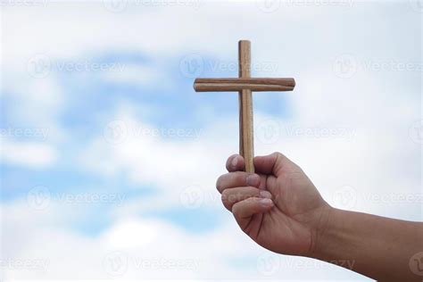 holding cross stock  images  backgrounds
