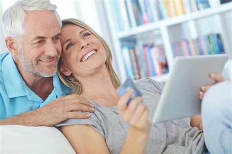 Shopping Together Has Never Been Easier A Happy Mature Couple Sitting