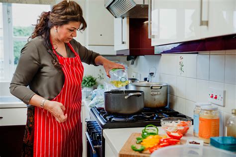 Woman Cooking In The Kitchen