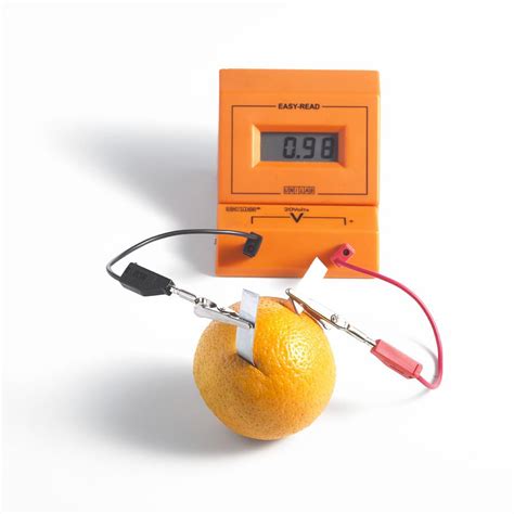 Orange Battery Photograph By Fine Art America