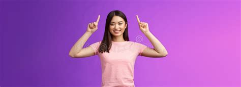 Cute Assertive Indian Asian Cheerful Girl Standing Isolated With Both Raise Hands Up Pointing