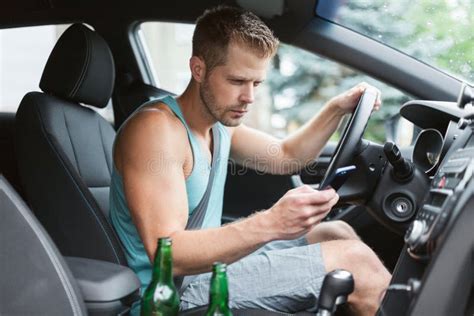 Careless Driver Using A Mobile Phone Whilst Driving Stock Photo Image