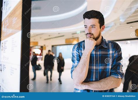 Young Man In The Shopping Mall Stock Photo Image Of Casual Brooding