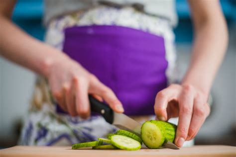 Free Photo Crop Woman Cutting Fresh Cucumber