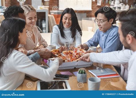 Young Business Team Having Lunch Break In Office Stock Image Image Of