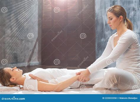 Professional Masseur Doing Thai Massage Therapist Is Making Body