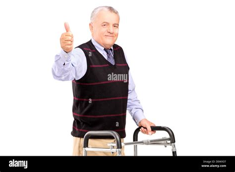 A Mature Gentleman Using A Walker And Giving A Thumb Up Isolated On