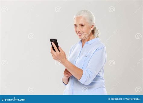 Mature Smiling Woman Using Smartphone Isolated Stock Photo Image Of