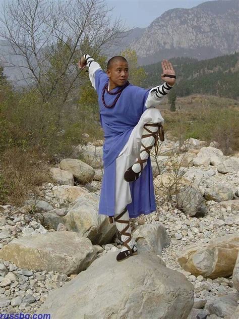 Shaolin Kung Fu Master On Rocks