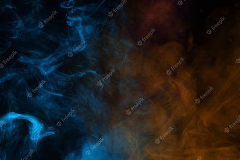 Premium Photo | Blue and pink steam on a black background