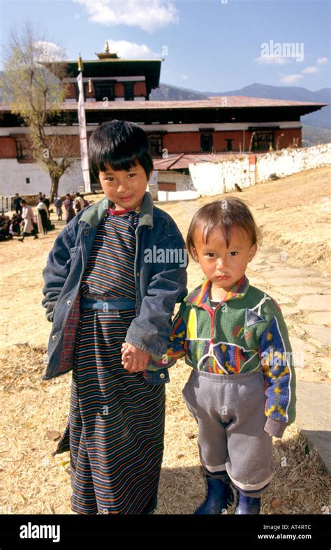 Bhutan Paro Children In Front Of Paro Dzong Stock Photo Alamy