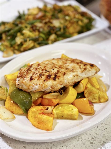 Yogurt Marinated Grilled Chicken Breast With Sautéed Brussel Sprouts And Roasted Vegetables