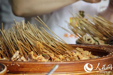 Eating Snack Food At Jinli Ancient Street In Chengdu Study In China