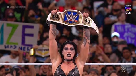 WWE fans are emotional after Rhea Ripley breaks character during ...