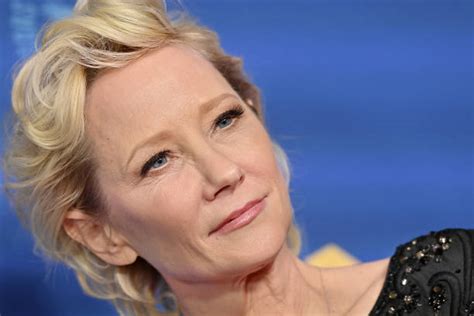 Anne Heche Is Reportedly In “extremely Critical Condition” Remains In