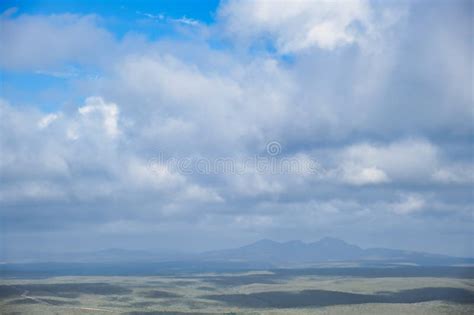 Vast Abstract Landscape With Hills In Soft Grey Green Tones And A